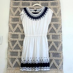 J.Crew white linen and cotton dress with delicate navy eyelet detail.